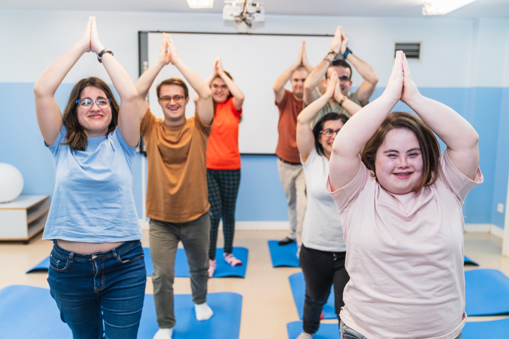 Group doing yoga — inclusive disability support coordination Melbourne by CareAU.