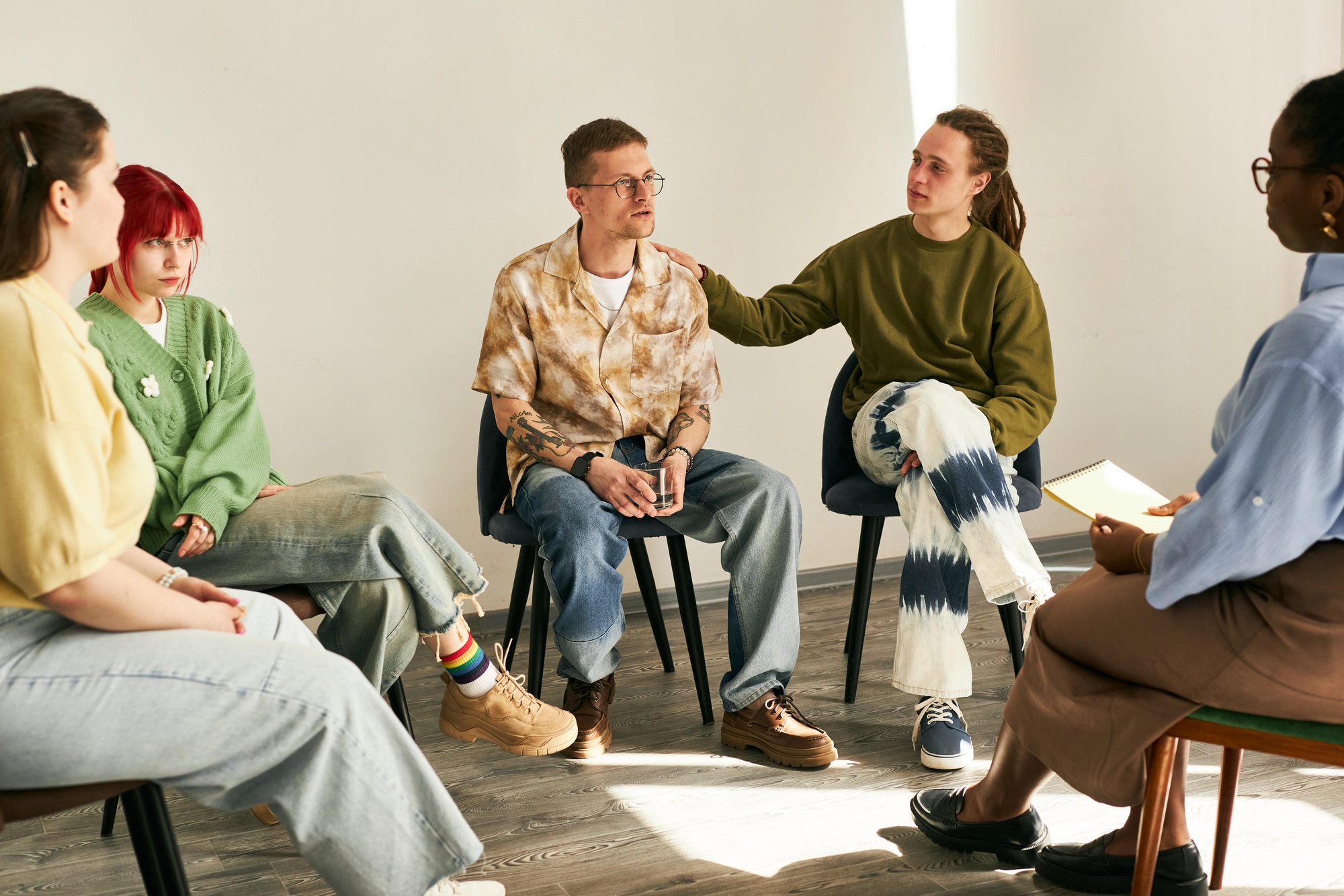 Group Therapy Session with Diverse Individuals Participating