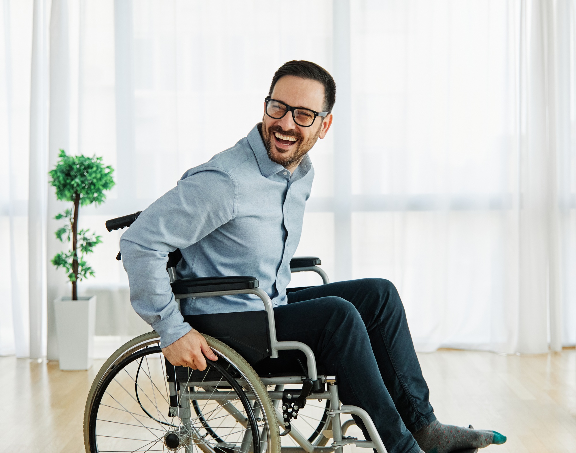 disability wheelchair disabled man handicap sitting handicapped health young wheel care