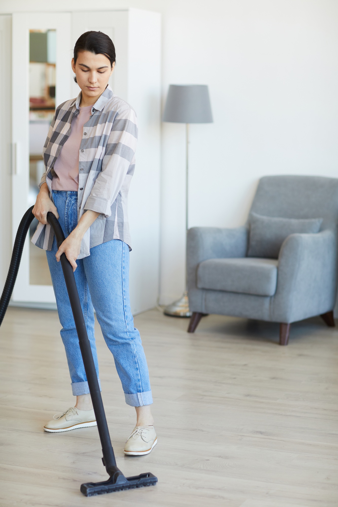 Maid cleaning the house
